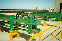 Kwinana - Pipe handling system for plasma cutting robot processing steel pipe up to 750mm bore.